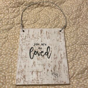 Hanging wooden sign